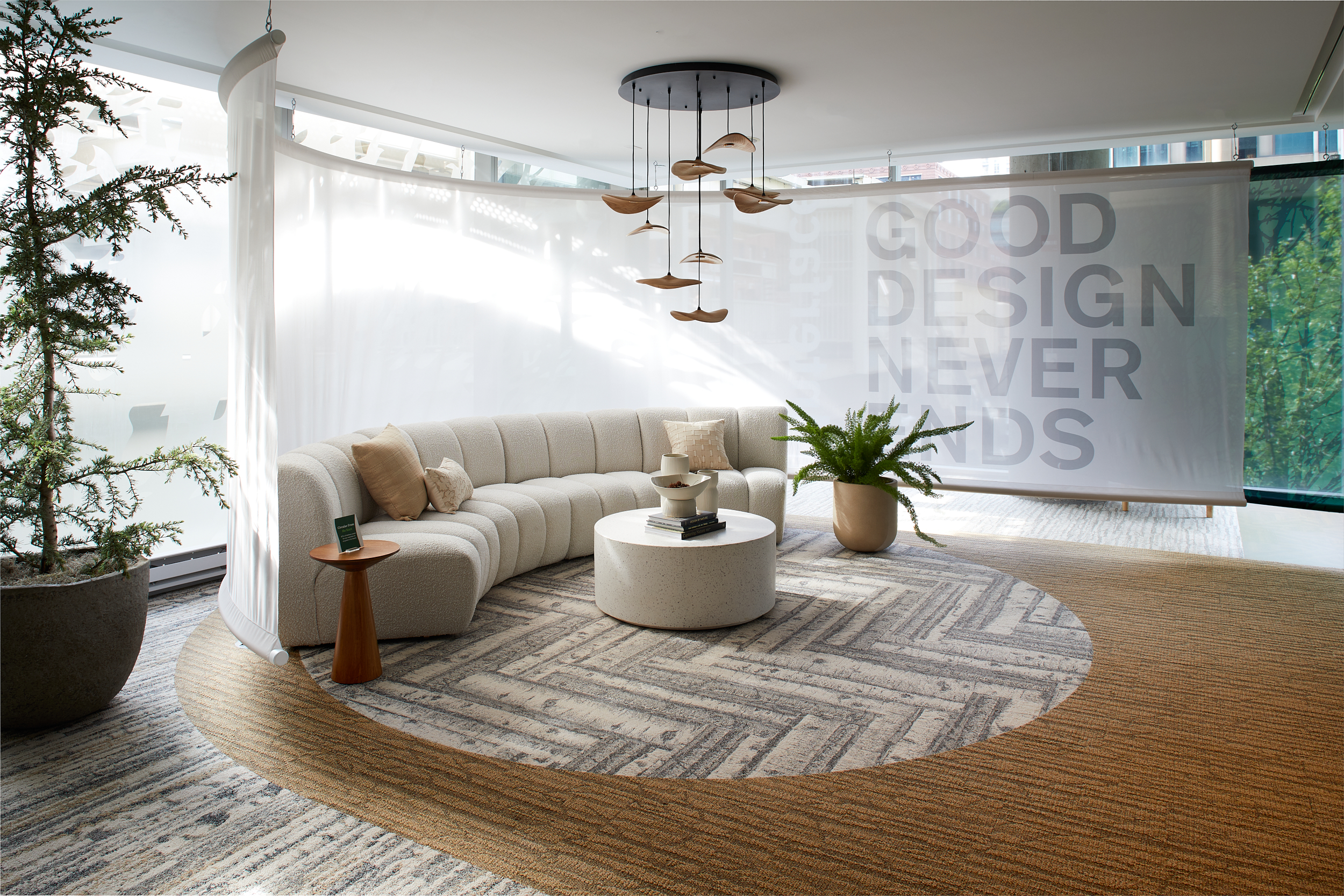 Interface First Light, Spruce it Up and Quiet Grove plank carpet tile in showroom collaborative space